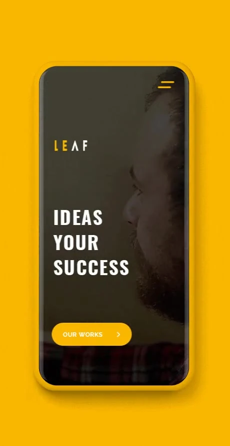 Phone: the hero with a background video, the line Ideas your success and an Our works button